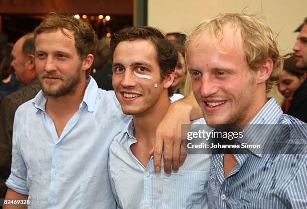 Actor Maximilian Brueckner and his brothers Xaver Brueckner and Florian Bruecker attend the 'Raeuber Kneissl' film premiere at Odeonsplatz Filmcasino...