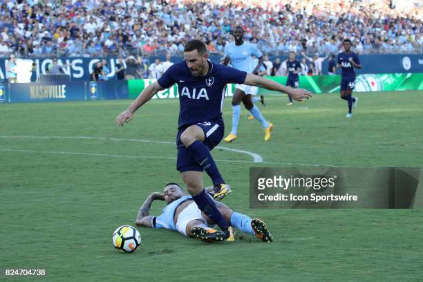 Tottenham Hotspur forward Vincent Janssen moves past the sliding effort of Manchester City defender Nicolas Otamendi late in the game between...