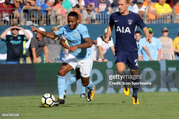 Manchester City forward Raheem Sterling looks for a shot in the game between Manchester City and Tottenham Hotspur. Manchester City defeated...