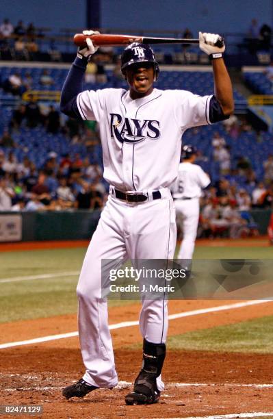 Outfielder B.J. Upton of the Tampa Bay Rays reacts after he strikes out during the eighth inning against the Los Angeles Angels during the game on...