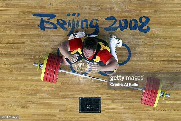 Matthias Steiner of Germany celebrates winning the gold medal in the Men's 105 kg group weightlifting event at the Beijing University of Aeronautics...