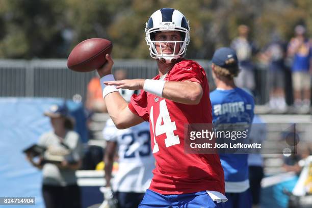 Sean Mannion of the Los Angeles Rams throws a pass during Training Camp at Crawford Field on July 30, 2017 in Irvine, California.