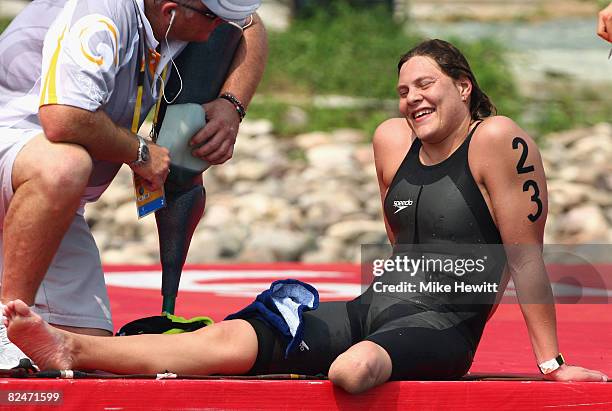 Natalie Du Toit of South Africa smiles after competing in the Women's Marathon 10km swimming event at the Shunyi Olympic Rowing-Canoeing Park during...