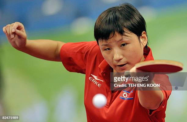 North Korea's table tennis player Kim Jong plays against Romania's Daniela Dodean in their women's singles table tennis preliminary round match at...