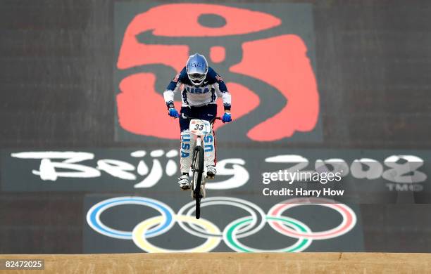 Jill Kintner of the United States competes in the Women's Seeding phase of the BMX competition at the Laoshan Bicycle Moto Cross Venue during Day 12...