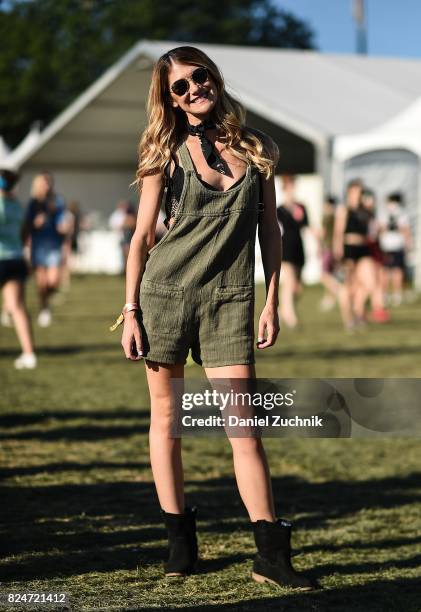 Festival goer is seen wearing a green jumpsuit during the 2017 Panorama Music Festival Day 3 at Randall's Island on July 30, 2017 in New York City.