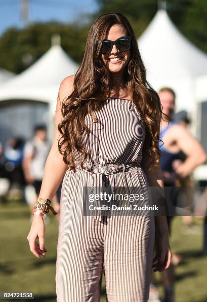 Festival goer is seen wearing a black and white striped jumper during the 2017 Panorama Music Festival Day 3 at Randall's Island on July 30, 2017 in...