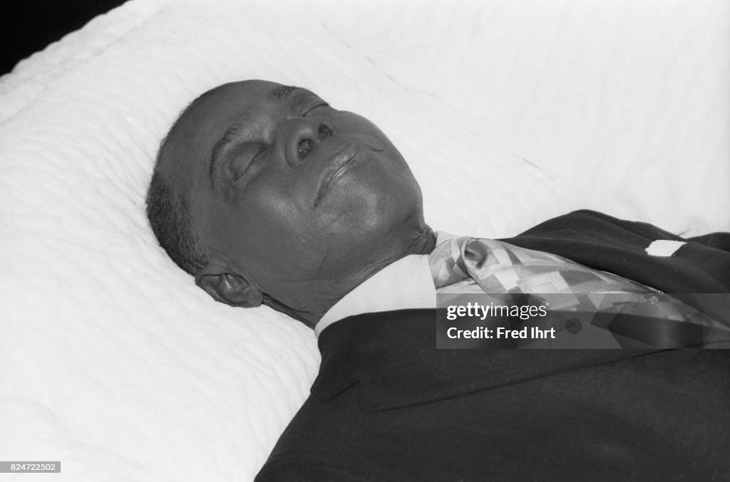 Louis Armstrong dead body in open casket at his funeral at...