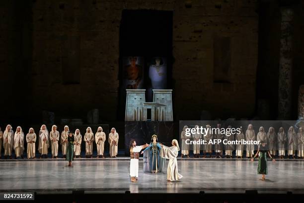 Argentinian tenor Marcelo Alvarez as Radames performs the opera "Aida" by Giuseppe Verdi, on July 30, 2017 in Orange, southern France, during the...