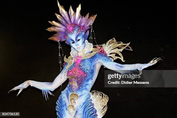 Model poses with her bodypainting designed by bodypainting artist Olga Popova from Russia during the 20th World Bodypainting Festival 2017 on July...