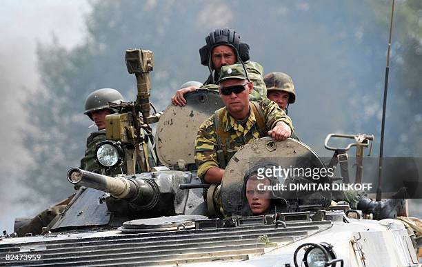 Russian armoured vehicle drives on the Gori-Tbilisi road near the village of Khurvaleti on August 20, 2008. The speaker of Russia's upper house of...