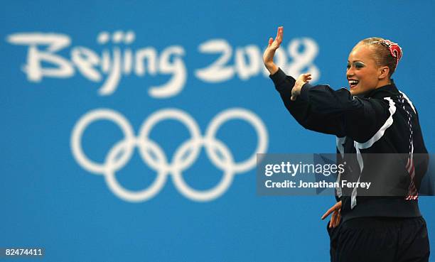 Christina Jones and Andrea Nott of the United States wave to the crowd before competing in the Synchronised Swimming Duet Free Routine Final at the...