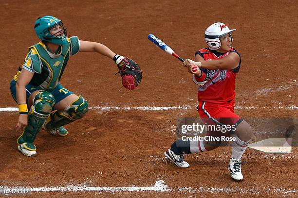 Megu Hirose of Japan hits a 2-run home ru in the bottom of the fourth inning against Australia during the women's softball bronze medal final event...