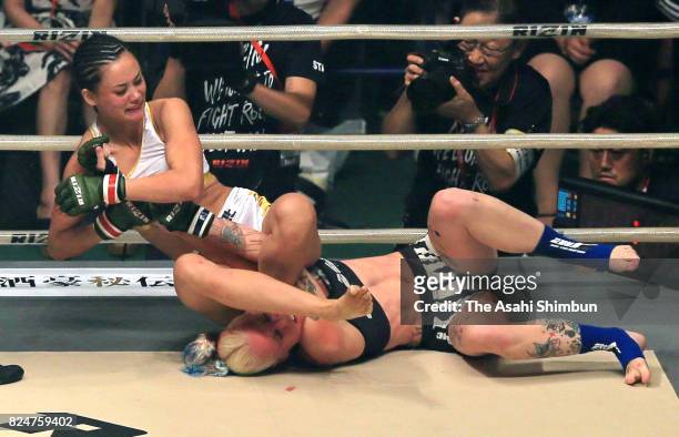 Shinju Nozawa Auclair of Japan and Sheena Star of the United States compete in the RIZIN 57.0kg Woman MMA Rules bout at Saitama Super Arena on July...