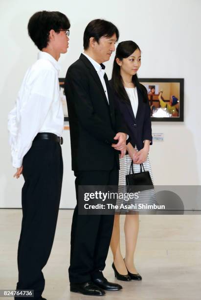 Prince Akishino and his second daughter Princess Kako visit the Sendai Mediatheque to see pictures of the award winners of the 41st All Japan High...