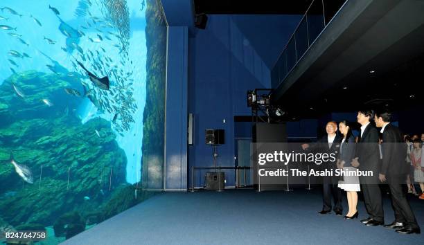 Prince Akishino and his second daughter Princess Kako visit the Sendai Umino-Mori Aquarium on July 30, 2017 in Sendai, Japan.