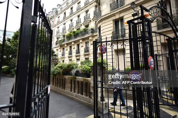 Pedestrian walks near the home of French actress Jeanne Moreau in Paris on July 31 after her death at the age of 89 was announced. French actress...