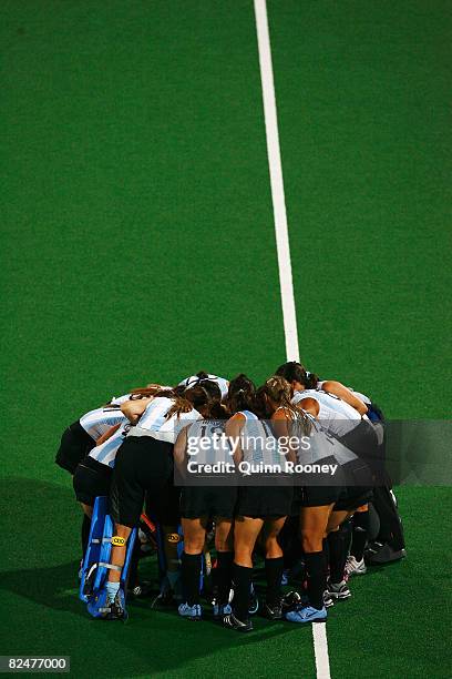 Argentina players huddle during the Women's Semifinal 2 Match W34 between Netherlands and Argentina at the Olympic Green Hockey Field during Day 12...
