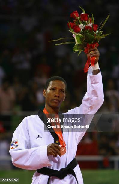 Silver medalist Yulis Gabriel Mercedes of Dominican Republic poses on the podium during the presentation ceremony of the taekwondo Men's -58kg at the...