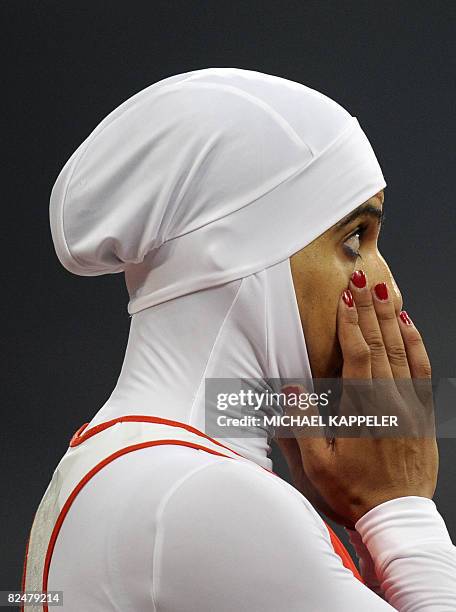 Bahrain's Roqaya al-Gassra prepares to compete in the women's 200m semi-final 2 at the "Bird's Nest" National Stadium during the 2008 Beijing Olympic...