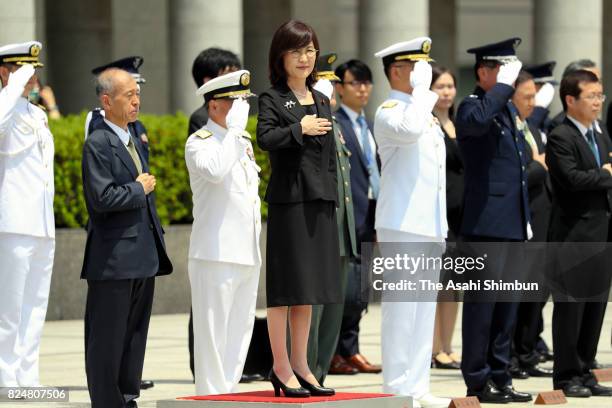 Outgoing Defense Minister Tomomi Inada reviews the honour guard at the Defense Ministry on July 31, 2017 in Tokyo, Japan.