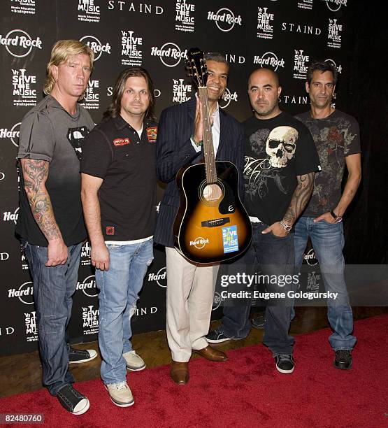 Drummer John Wysocki, Guitarist Mike Mushok, Executive Director VH1 SMTF Paul Cothran, Singer Aaron Lewis and Bassist Johnny April of Staind pose at...