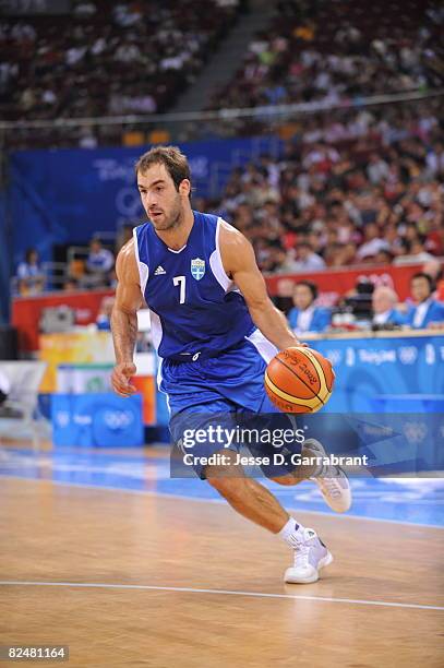 Vassilis Spanoulis of Greece drives against Argentina during the men's quarter-finals basketball game at the 2008 Beijing Olympic Games at the...