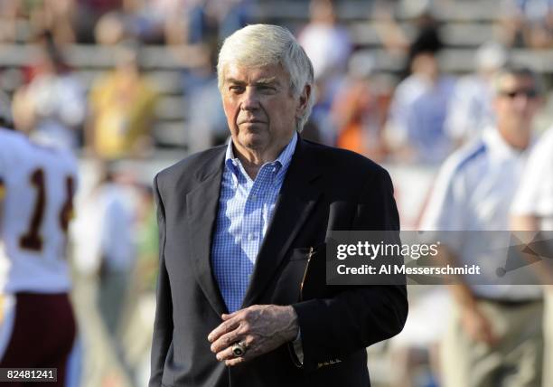 Sen. Jack Kemp watches warmups as the Indianapolis Colts play against the Washington Redskins in the Pro Football Hall of Fame Game at Fawcett...