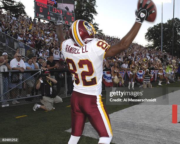 Wide receiver Antwaan Randle El of the Washington Redskins celebrates a catch against the Indianapolis Colts in the Pro Football Hall of Fame Game at...