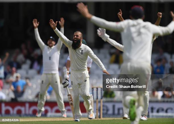 Moeen Ali of England takes the wicket of Morne Morkel of South Africa for his hat-trick during day five of the 3rd Investec Test match between...