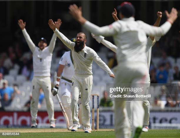 Moeen Ali of England takes the wicket of Morne Morkel of South Africa for his hat-trick during day five of the 3rd Investec Test match between...