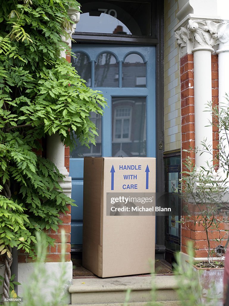 Cardboard box on doorstep