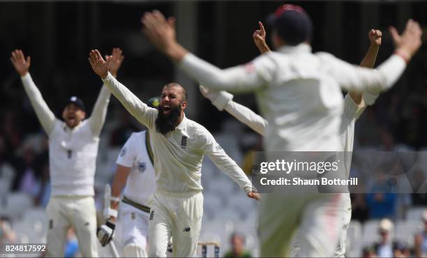 Moeen Ali of England takes the wicket of Morne Morkel of South Africa for his hat-trick during day five of the 3rd Investec Test match between...