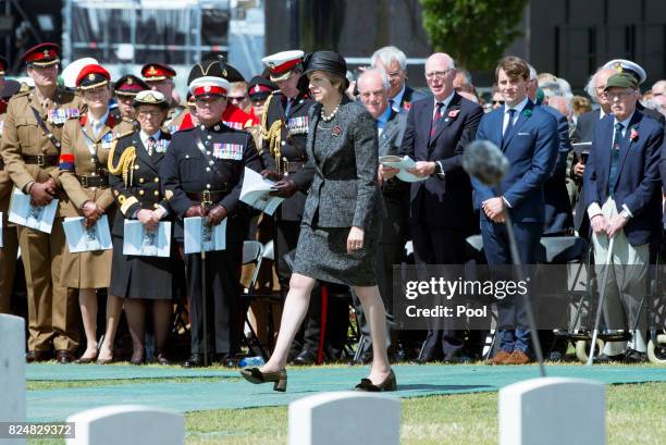 Prime Minister Theresa May during a ceremony at the Commonwealth War Graves Commisions's Tyne Cot Cemetery on July 31, 2017 in Ypres, Belgium. The...