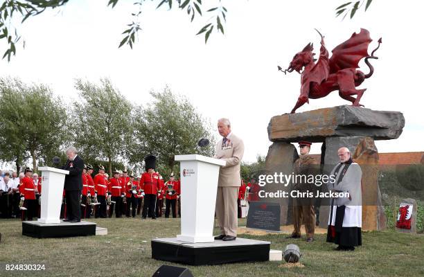 Prince Charles, Prince of Wales gives a reading as he attends the Welsh National Service of Remembrance at the Welsh National Memorial Park to mark...