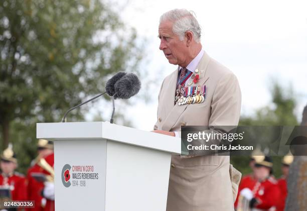 Prince Charles, Prince of Wales gives a reading as he attends the Welsh National Service of Remembrance at the Welsh National Memorial Park to mark...