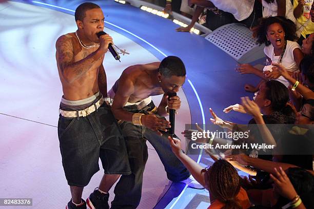 Recording artists Soulja Boy and Bow Wow perform at the taping of the 2,000th episode of "106 & Park" at the BET studios on August 19, 2008 in New...