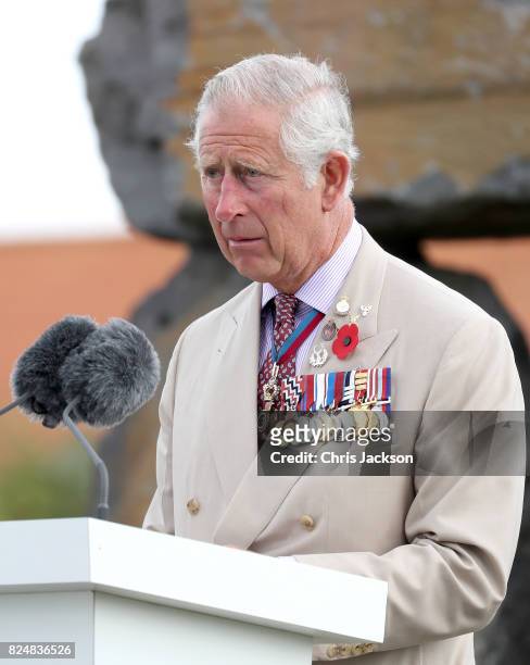 Prince Charles, Prince of Wales gives a reading as he attends the Welsh National Service of Remembrance at the Welsh National Memorial Park to mark...