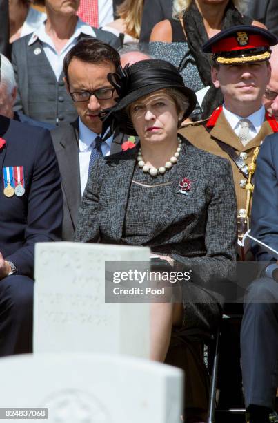 Prime Minister Theresa May during a ceremony at the Commonwealth War Graves Commisions's Tyne Cot Cemetery on July 31, 2017 in Ypres, Belgium. The...