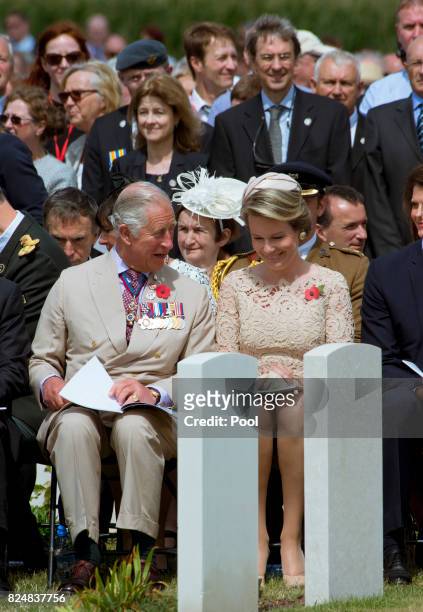 Prince Charles, Prince of Wales and Queen Mathilde of Belgium during a ceremony at the Commonwealth War Graves Commisions's Tyne Cot Cemetery on July...
