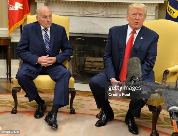 President Donald Trump speaks to the press after the new White House Chief of Staff John Kelly was sworn in, in the Oval Office of the White House,...