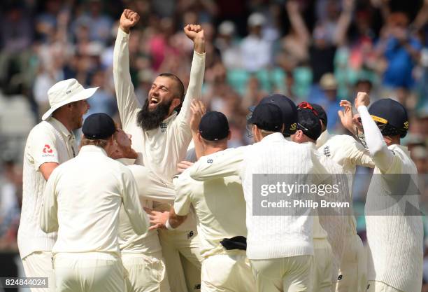 Moeen Ali of England celebrates after taking a hat trick after dismissing Morne Morkel during the fifth day of the 3rd Investec Test match between...