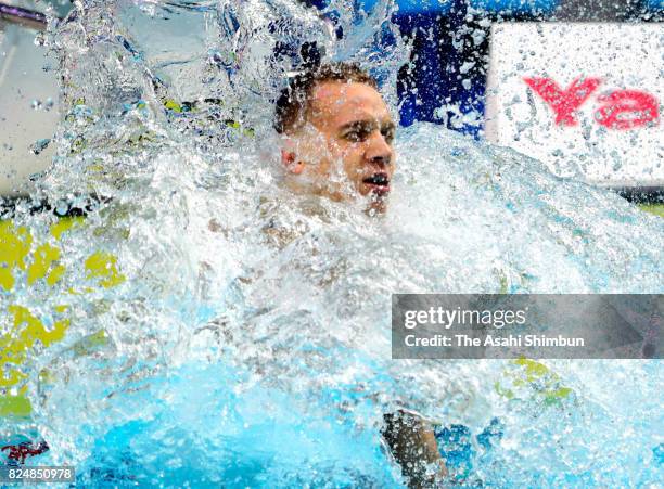 Caeleb Remel Dressel of the United States celebrates winning the gold medal in the Men's 100m Butterfly on day sixteen of the Budapest 2017 FINA...
