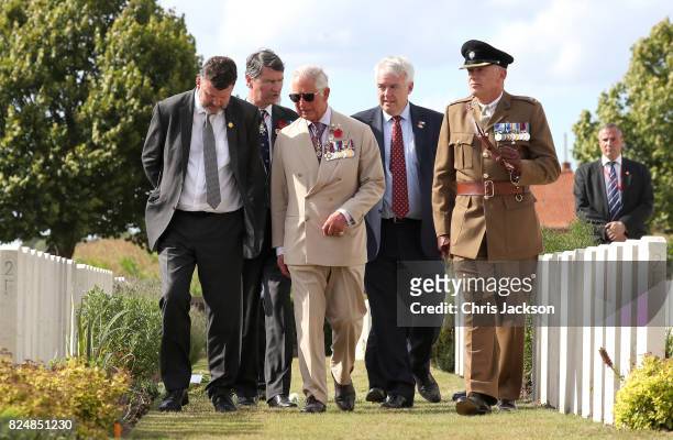 Prince Charles, Prince of Wales with Vice Admiral Sir Timothy Laurence and First Minister of Wales Carwyn Jones during a visit to Artillery Wood...