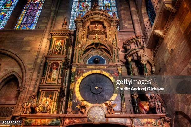 astronomical clock located in the cathédrale notre-dame of strasbourg. - astronomical clock stock pictures, royalty-free photos & images