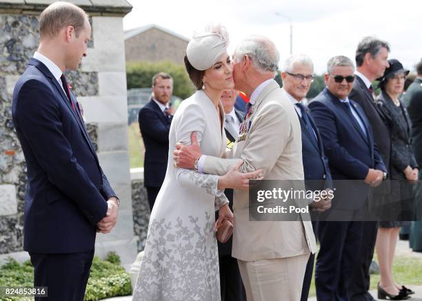 Prince Charles, Prince of Wales greets Catherine, Duchess of Cambridge and Prince William, Duke of Cambridge during a ceremony at the Commonwealth...