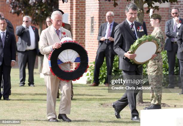 Prince Charles, Prince of Wales and Vice Admiral Sir Timothy Laurence lay wreaths during a visit to Artillery Wood Cemetery, which includes the...