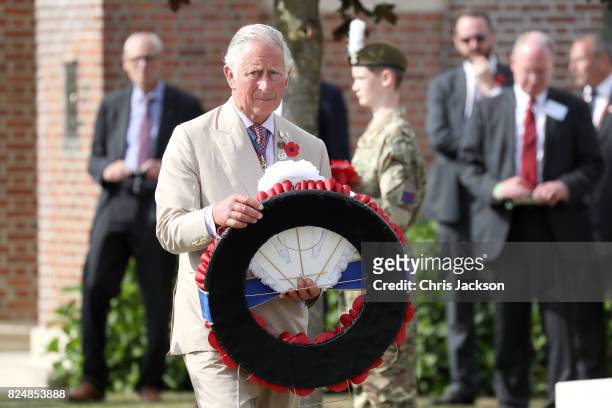 Prince Charles, Prince of Wales lays a wreath during a visit to Artillery Wood Cemetery, which includes the graves of poets Hedd Wyn, Francis...