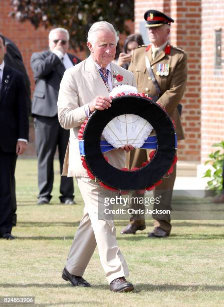 Prince Charles, Prince of Wales lays a wreath during a visit to Artillery Wood Cemetery, which includes the graves of poets Hedd Wyn, Francis...