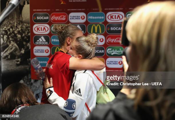 Sanne Troelsgaard Nielsen of Denmark hugs Anja Mittag of Germany after the match in the mixed zone during the UEFA Women's Euro 2017 Quarter Final...